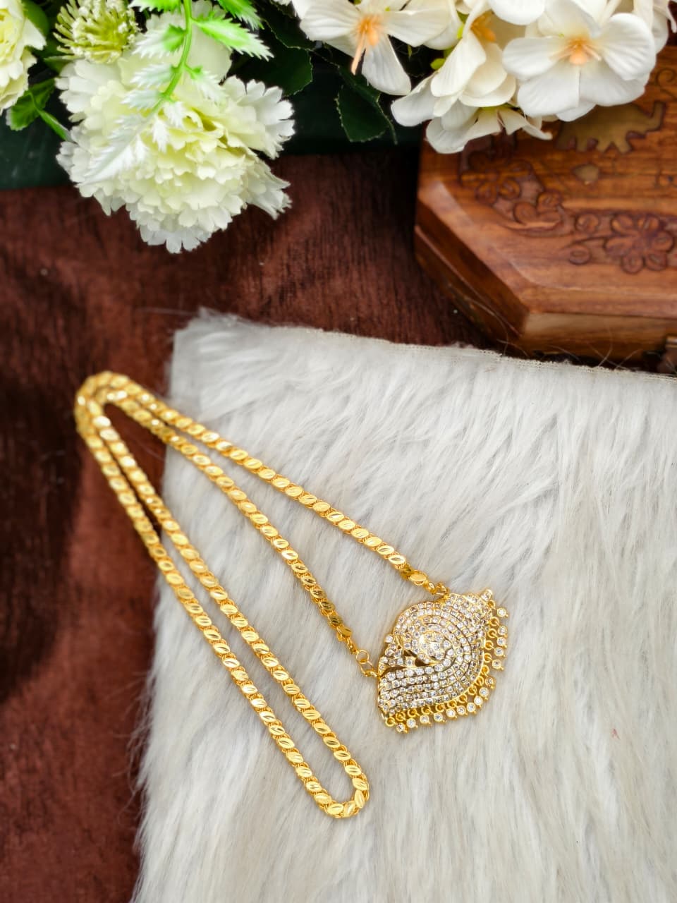 Women Impone Stone Dollar Eye Chain with Gold Plated Finish